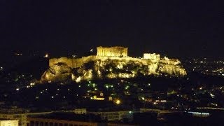 Parthenon Acropolis and Monastiraki square by night from a Roof garden cafe bar [upl. by Eleaffar]