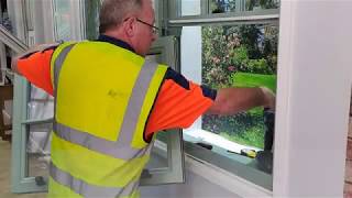 How to fit the bottom sash on PVCu Sliding Sash Windows [upl. by Pirnot309]