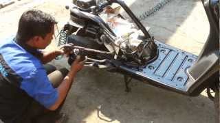 Dinitrol Under body Anti rust treatment of a Honda Activa HET model scooter in Mumbai [upl. by Ollopa]