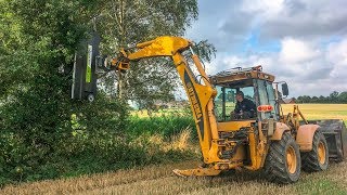 Hedge Mulcher Mounted on Hydrema 906C Backhoe Loader  GreenTec RM 232 [upl. by Streetman]