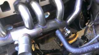 89 Cherokee New Exhaust Manifold Installation [upl. by Reckford]