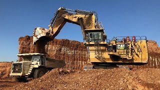 Excavator Dump Truck Digging Limestone On Road Construction Kobelco SK200 Komatsu PC200 [upl. by Alberto]