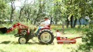 Clearing brush with tractor [upl. by Tressa72]