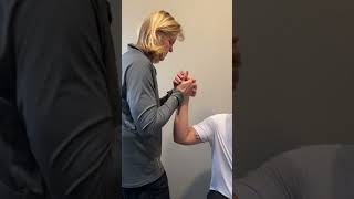 technique for irritable wrist  Compress carpals  create passive swing of forearm with traction [upl. by Lathrope]