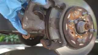 How to Replace Rotor and Brake Pads on a 2004 Mitsubishi Lancer ES [upl. by Gnel]