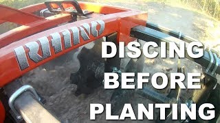 Using a Disc Harrow Discing a field [upl. by Tucker14]