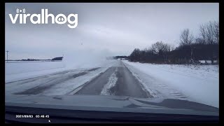 Dashcam Captures Car Fishtailing Into a Snowy Ditch  ViralHog [upl. by Pancho659]