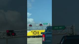 Brightline train going through railroad crossing on Dixie Highway train floridabeach brightline [upl. by Noed]