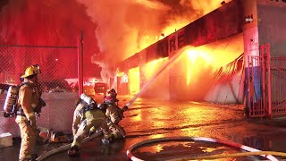 Canoga Park CA Greater alarm fire rips through a row of commercial businesses around 2am [upl. by Hartman]