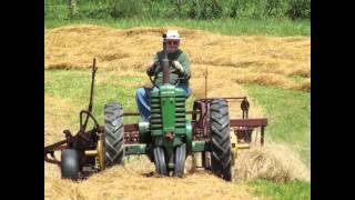 Making Hay with a John Deere H newer [upl. by Sateia]