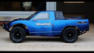 Traxxas Slash LCG Takes On Indoor Clay Track [upl. by Llehsim11]