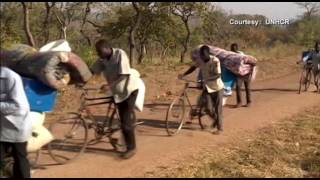 South Sudan Refugees Pour into Uganda [upl. by Dewees]