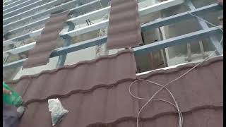 Installing stone coated roof [upl. by Raddie]