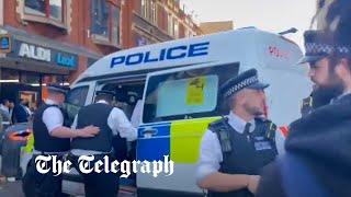 Video appears to show police officer repeatedly hitting an individual in the head in Dalston [upl. by Eelanaj]