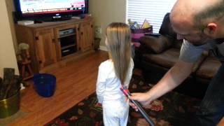 Girl puts hair in ponytail with vacuum [upl. by Tihw]