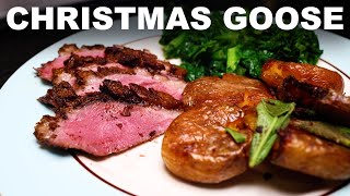 Roast goose with Christmas spices black cherry gravy goosefat roast potatoes and mustard greens [upl. by Nesnej]