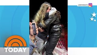 Watch Lenny Kravitz lifts and hugs crying fan during concert [upl. by Aramois]