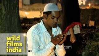 Man praying in front of his ancestors grave  Shabebarat [upl. by Weig]