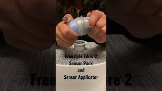 How to attach the Freestyle Libre 2 sensor pack and sensor applicator [upl. by Idnod]