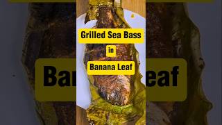 Grilled Sea Bass in Banana Leaf 🔥 cooking srilankancurry recipe foodie food seafood fishfry [upl. by Standing]