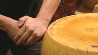 Cracking a Wheel of Parmigiano Reggiano  Cheese  Whole Foods Market [upl. by Wilfred219]