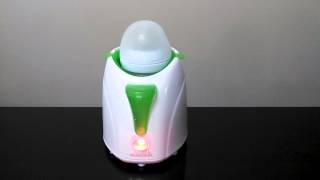 Munchkin High Speed Bottle Warmer in Action  Perfect Bottle Temperature [upl. by Nylle]