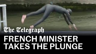 French sports minister swims in Seine ahead of Olympics [upl. by Anafetse257]