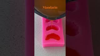 Person is creating gel wax mandarin slices for candle decorations [upl. by Viridi]