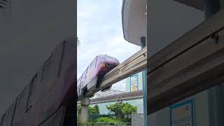 Sentosa Express Purple monorail departing Resorts World Station in Sentosa [upl. by Doownelg992]