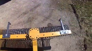 POV Video of Tractor Supply 6 Landscape Rake in Driveway Using the John Deere 2032R Tractor [upl. by Fiel]