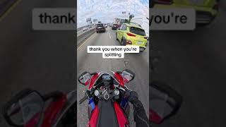 Safely splitting lanes motorbike driving tips [upl. by Thomajan]