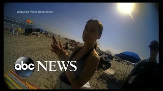 Police release bodycam video capturing womans violent beach arrest [upl. by Skees]