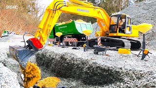 RC DIGGER AT THE QUARRY KOMATSU PC 290 LAYING PIPES MAN SCALEART TIPPER TRUCK VOLVO EC 160 RC [upl. by Norford]