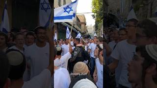 Group of Jews dancing with Israeli flags in the Muslim Quarter in Jerusalem Israel 2024 [upl. by Jacie]