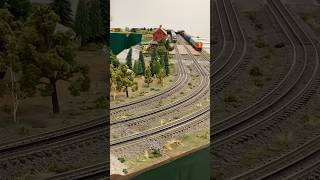 O Scale trains speed past at the Minnesota Twin Cities Model railroad show [upl. by Selrahcnhoj]