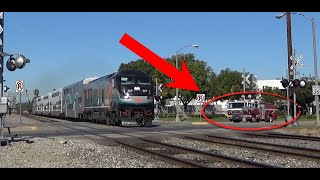 Metrolink Train and Firetruck Have a Horn Battle [upl. by Ryle421]