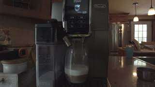 Delonghi Dinamica Plus Auto Coffee Machine 4K Realtime use [upl. by Ahtiekal]