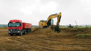 CAT 330F with TOP CON dual GPS loading dump trucks [upl. by Arel641]