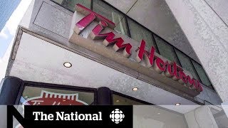 More Tim Hortons cut employee benefits over minimum wage increase [upl. by Enytsirhc377]