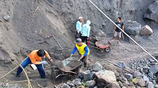 the process of separating the rock and black sand [upl. by Sirrap]