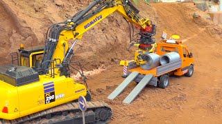 SPECIAL RC CONSTRUCTIONSITE MOMENTS RC KOMATSU PC 290 FUMOTEC LAY PIPES INTO THE GROUND [upl. by Anayhd]