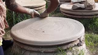 Injera mitad making near Addis Ababa Ethiopia Mogogo clay plate [upl. by Gerda]