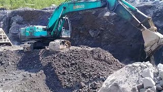 excavator working to dredge sand in sand mining [upl. by Fattal867]