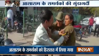 Video Asaram Bapus Supporters Attack Woman Police Brutally in Jodhpur [upl. by Aleekat]