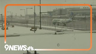 The end is in sight  Winter storm continues causing delays cancellations at DIA [upl. by Colleen]