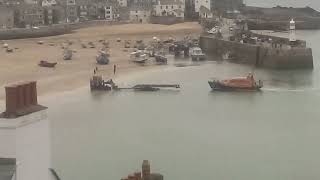 Lifeboat deployment vehicle in action St Ives Cornwall UK 25 September 2024 1747 [upl. by Ettenyar330]