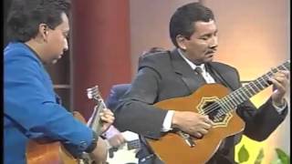 Música Ecuatoriana  Eduardo Morales y Wilson Pérez  quot Por aqui por allá quot [upl. by Merrow58]