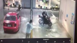 EPIC EMBARRASSMENT Dumbass on Motorbike tries to show off in Carwash and Fails Dismally [upl. by Hailee]