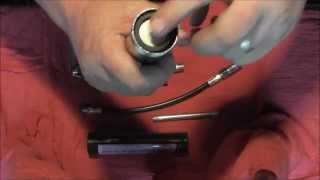 How to assemble and use a grease gun [upl. by Nenney]