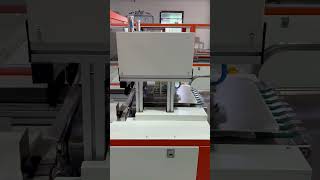 School uniform folding and packaging machine [upl. by Woll]